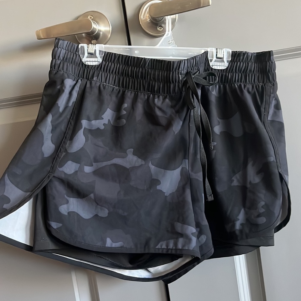 Velocity Womens shorts with built in spandex shorts. Size Large